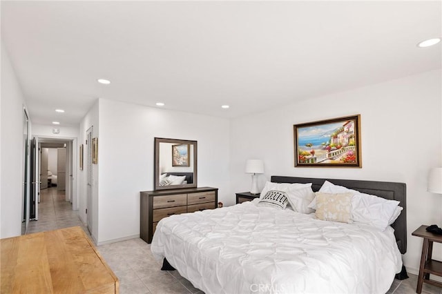 bedroom featuring light tile patterned floors