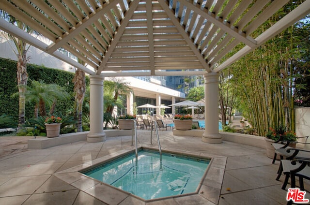 view of pool featuring a gazebo, a pergola, and a community hot tub