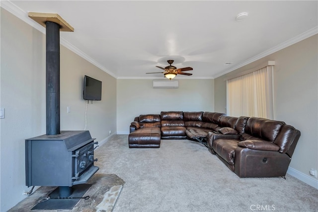 living room with carpet, a wood stove, and ornamental molding