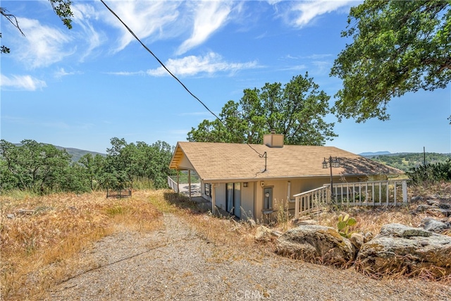 exterior space featuring a mountain view