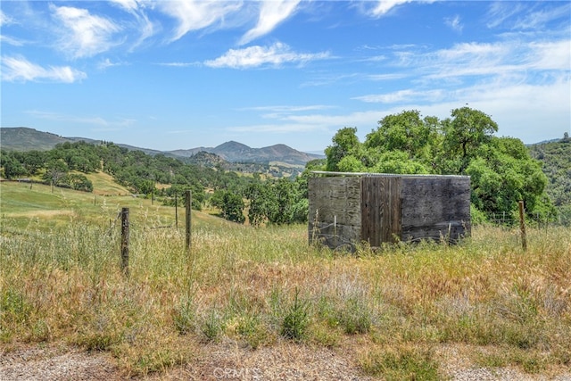 property view of mountains featuring a rural view