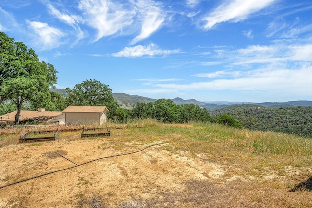 view of mountain feature featuring a rural view