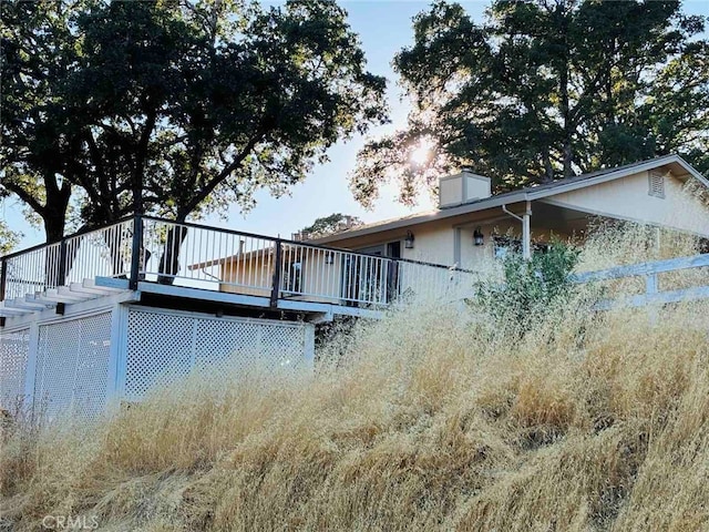 rear view of house with a deck