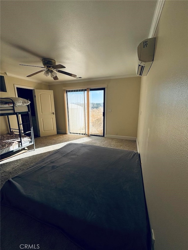 bedroom featuring carpet floors, ornamental molding, a wall mounted AC, and ceiling fan