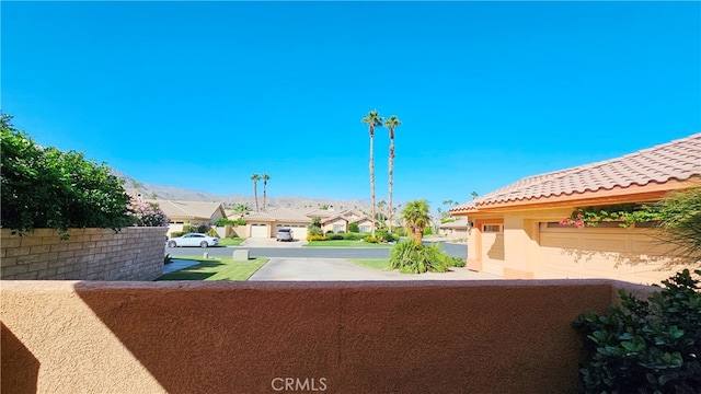 view of yard with a garage