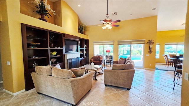 living room featuring high vaulted ceiling, light tile flooring, and ceiling fan