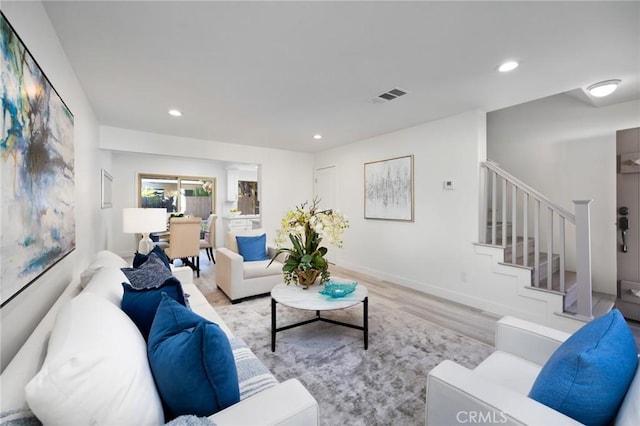 living room featuring light wood-type flooring