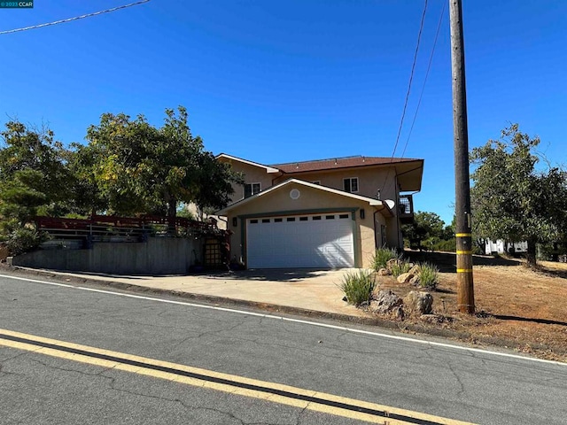 view of front of property featuring a garage