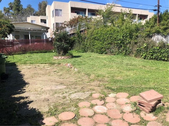 view of yard featuring fence