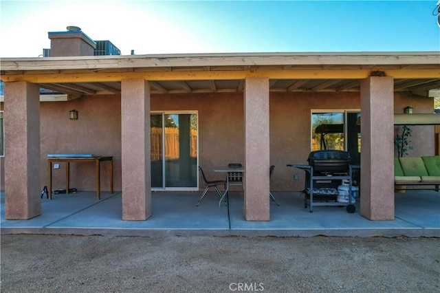 back of house featuring a patio