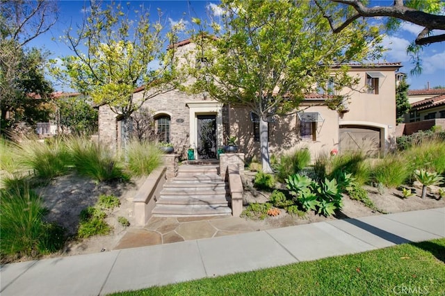 view of front of property featuring a garage