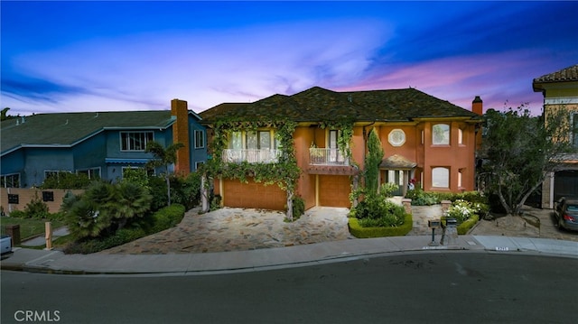 view of front of property with a garage