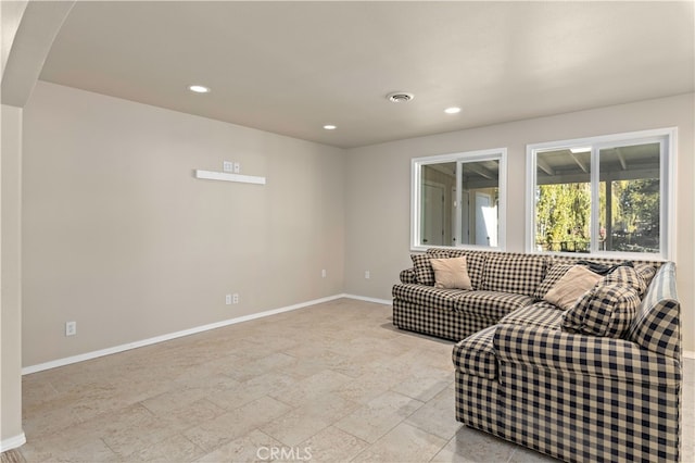 living room featuring light tile flooring