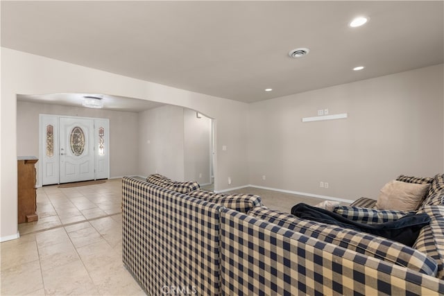 living room with light tile flooring