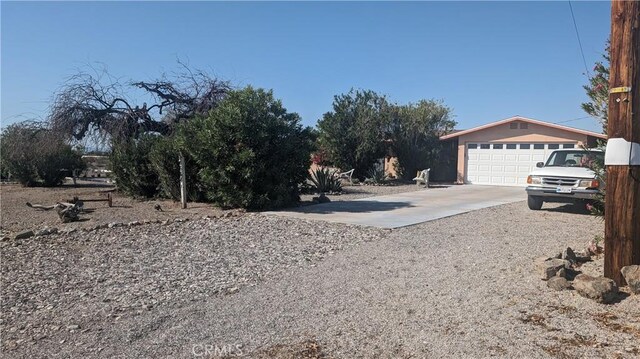 view of yard with a garage