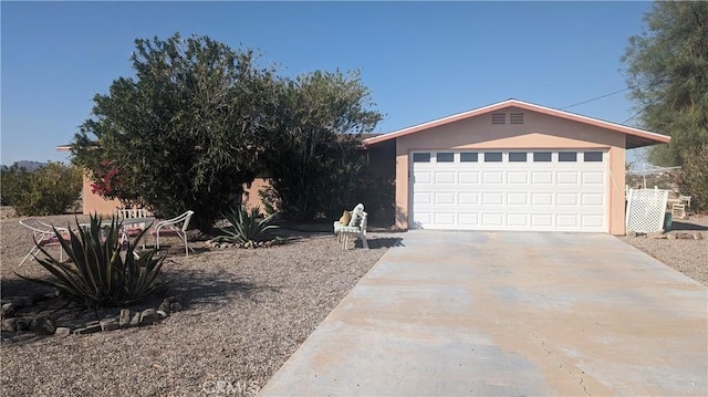 single story home with a garage