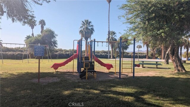 view of playground with a yard