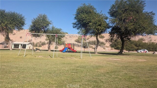 view of play area featuring a yard