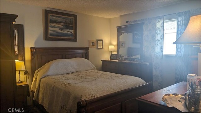 bedroom with a textured ceiling