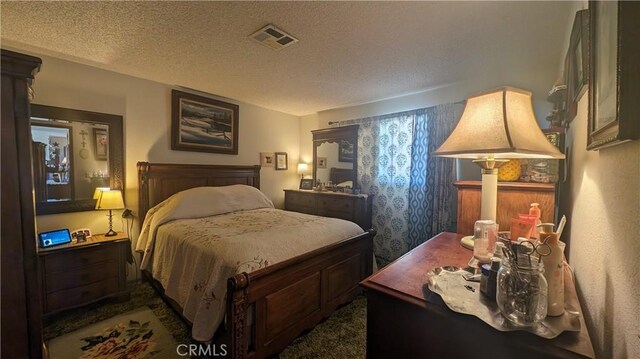 bedroom with a textured ceiling