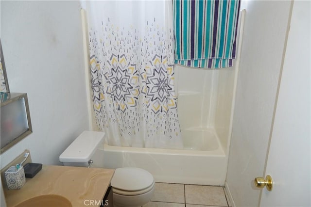 full bathroom with tile patterned flooring, vanity, toilet, and shower / bath combo with shower curtain