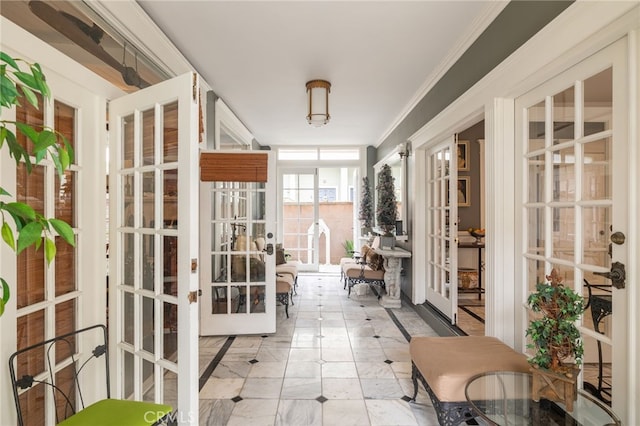 unfurnished sunroom with french doors