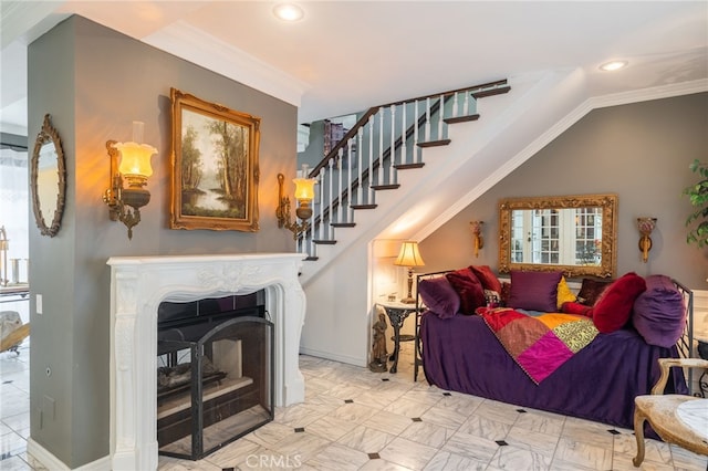 living room with vaulted ceiling and ornamental molding