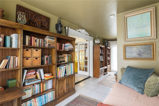 sitting room with light tile patterned floors