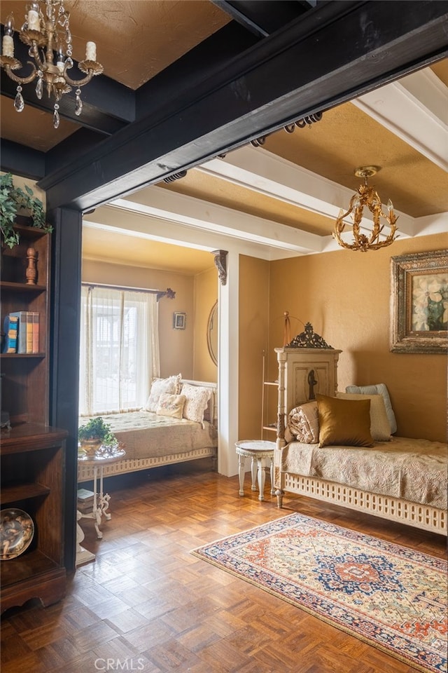 bedroom featuring beam ceiling, parquet floors, and a chandelier