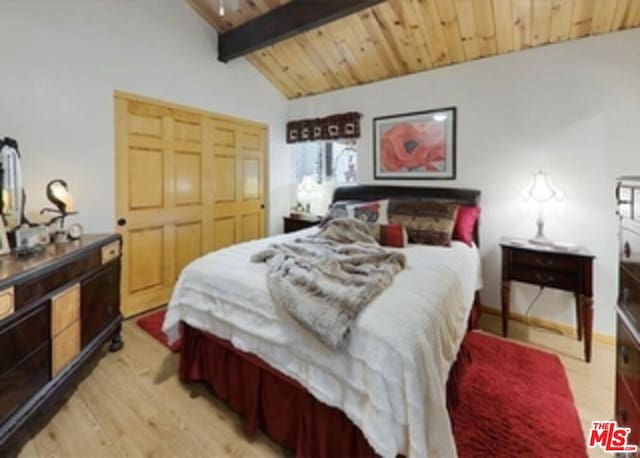 bedroom featuring wooden ceiling, light hardwood / wood-style flooring, and lofted ceiling with beams