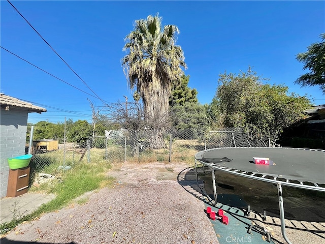 view of yard featuring a trampoline