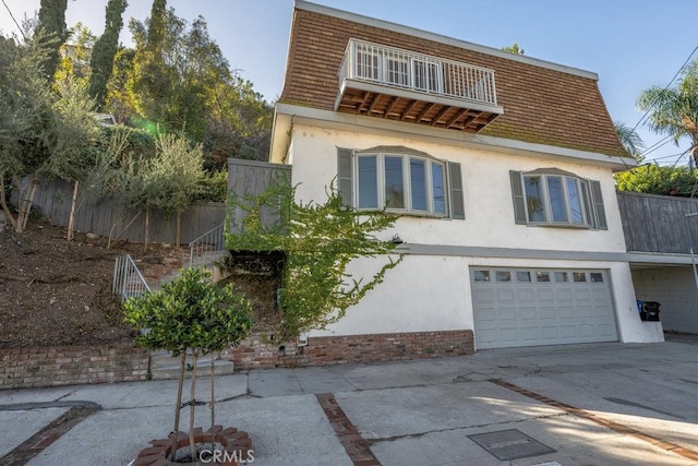 view of front of home with a garage