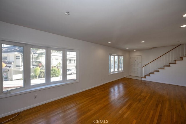 empty room with wood-type flooring