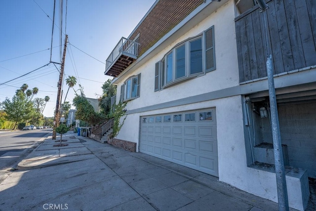 view of home's exterior with a garage