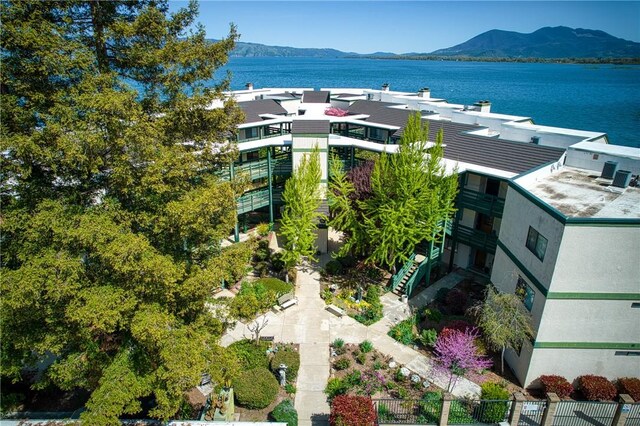 bird's eye view featuring a water and mountain view