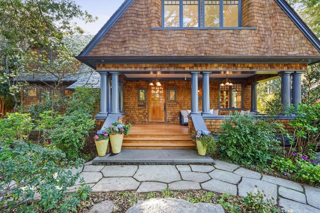 entrance to property featuring covered porch