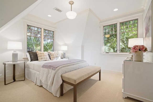 bedroom featuring light colored carpet and ornamental molding