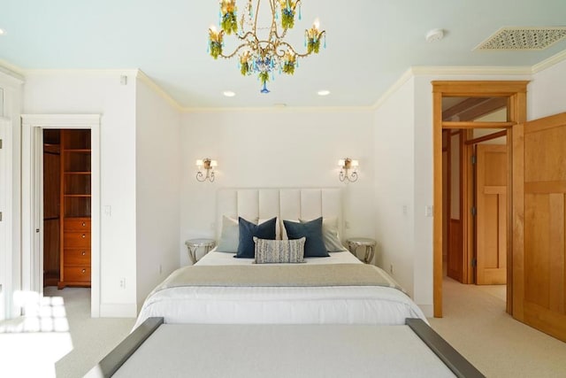 carpeted bedroom featuring crown molding and a chandelier