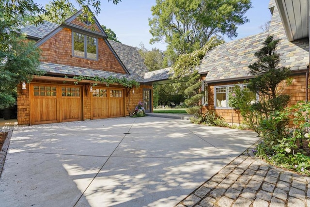 view of patio / terrace featuring a garage