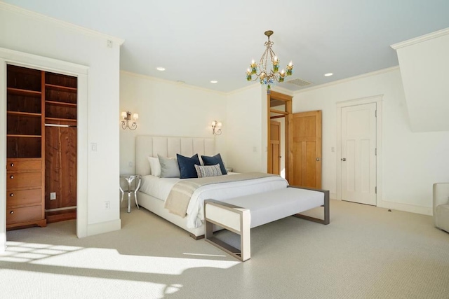 carpeted bedroom featuring ornamental molding and a chandelier