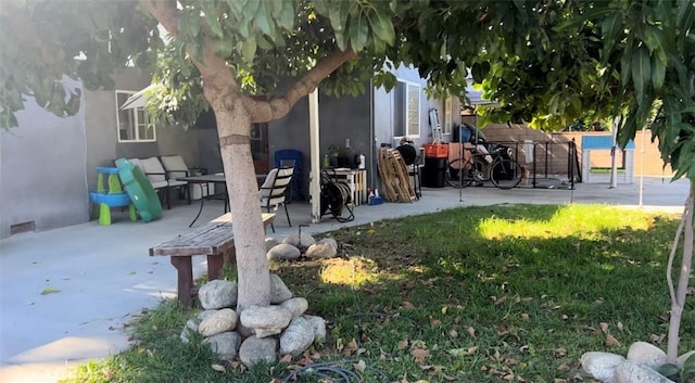 view of yard with a patio area and fence