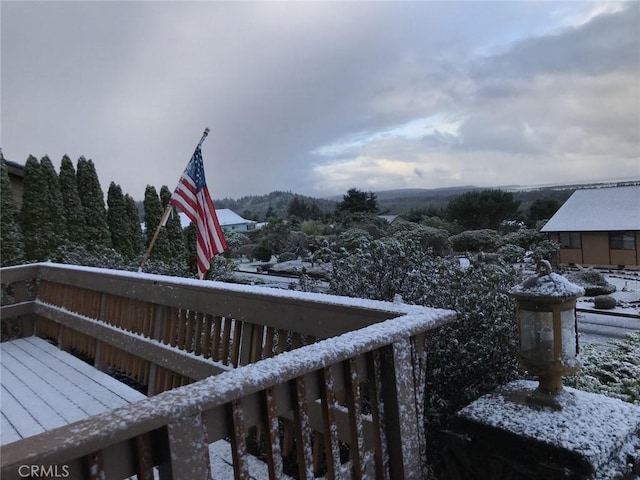 view of snow covered deck