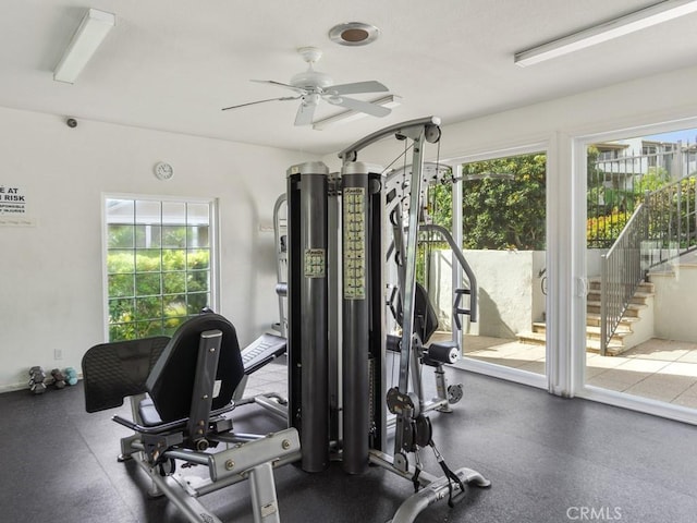 workout area featuring ceiling fan