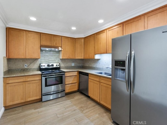 kitchen with sink, light wood-type flooring, backsplash, crown molding, and appliances with stainless steel finishes