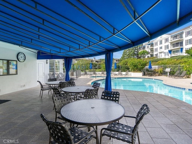 view of pool with a patio