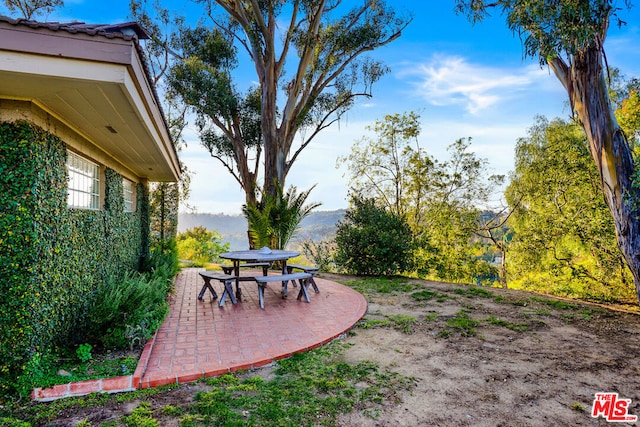 view of patio with a mountain view