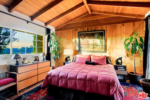 bedroom featuring lofted ceiling with beams, wood walls, and wooden ceiling