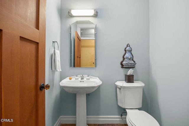 bathroom featuring toilet