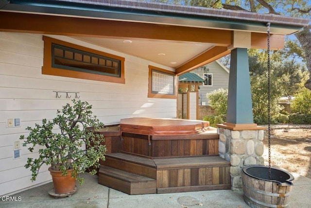 view of patio / terrace featuring a hot tub