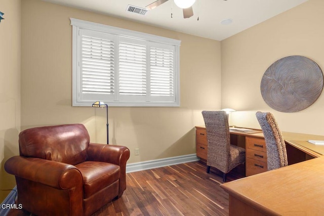 office space featuring ceiling fan and dark hardwood / wood-style floors